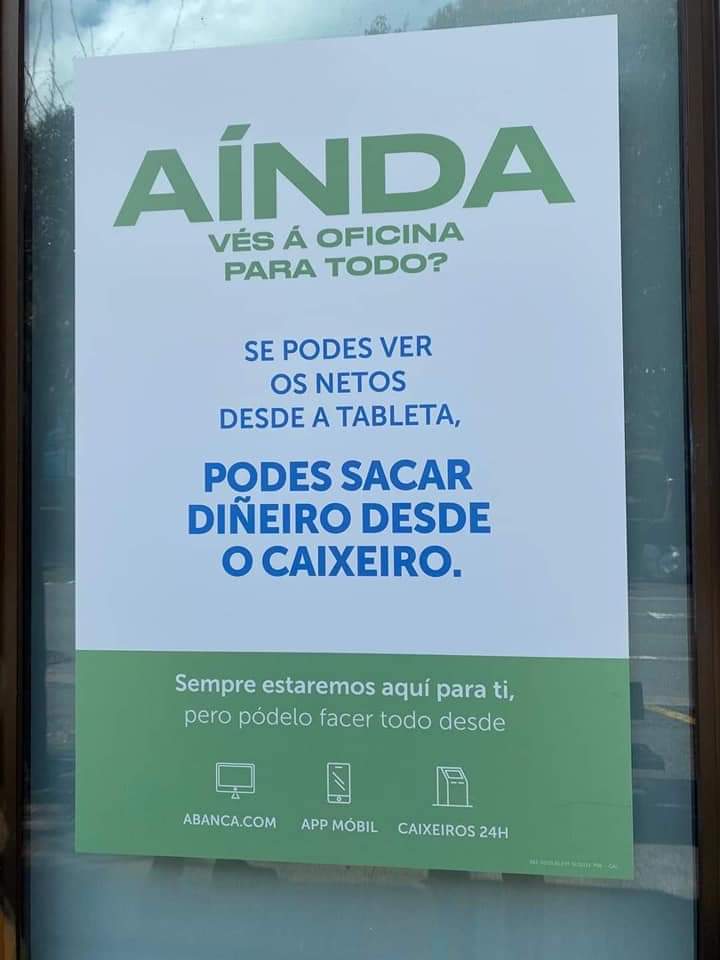 Uno de los carteles promocionales en una sucursal de Abanca